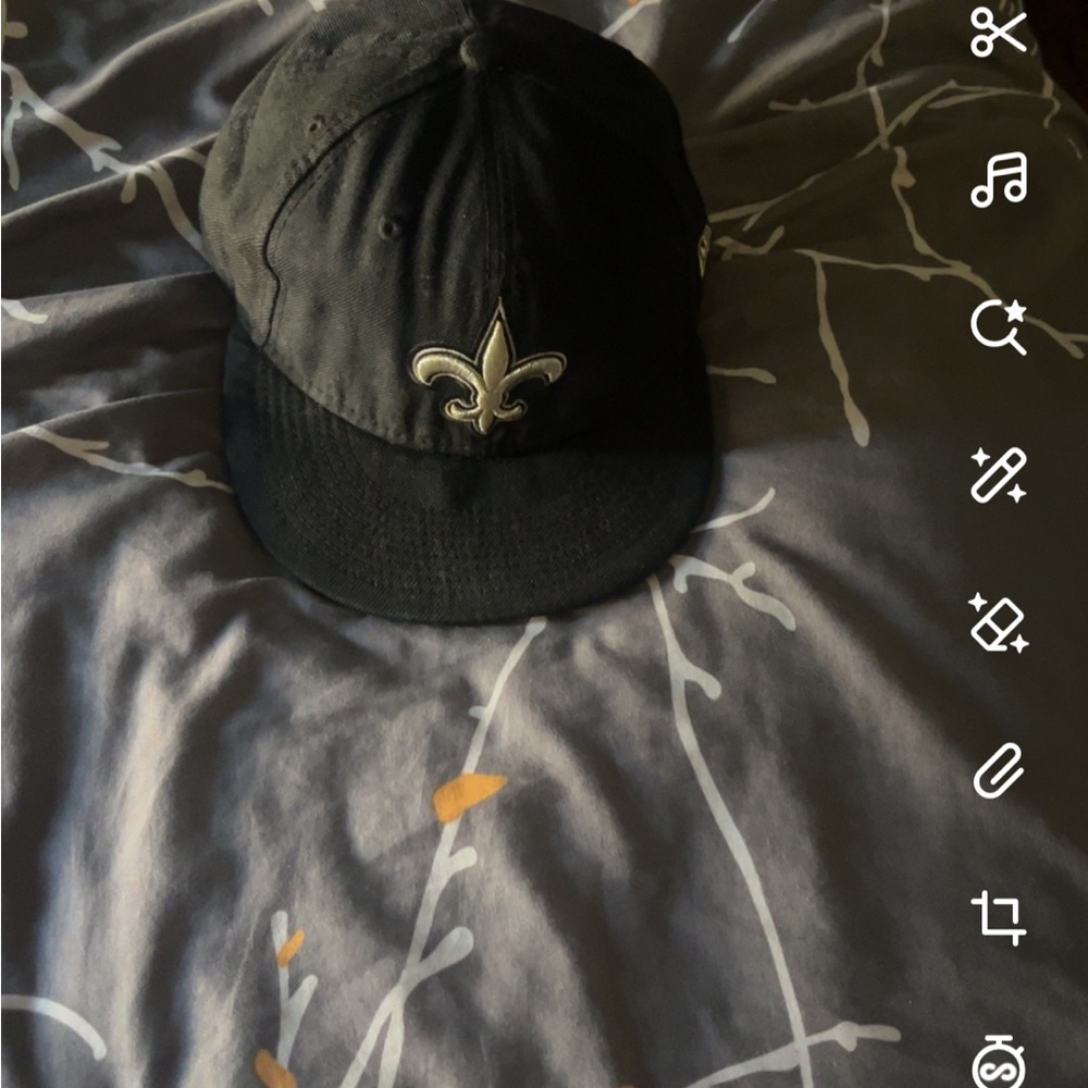 Black Cap with Fleur-de-Lis Emblem